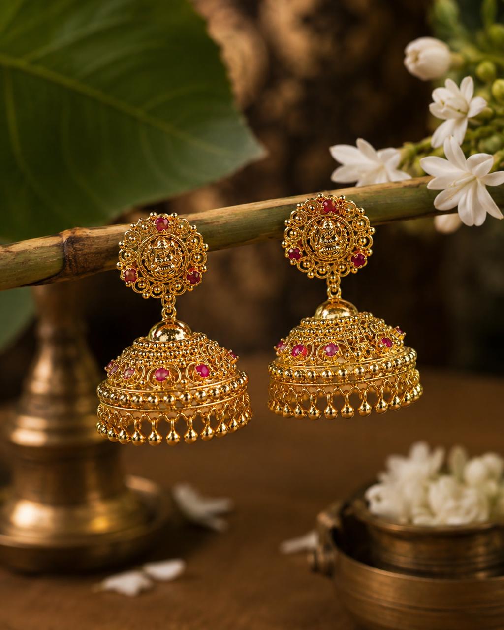 Lekshmi bridal jhumkka side profile ruby red stone detailing