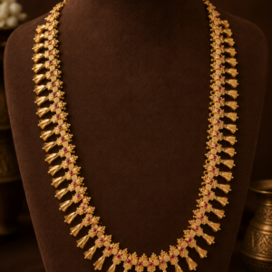 Shankupushpam Mala gold-plated long haram with floral conch shell motifs and antique finish - front view